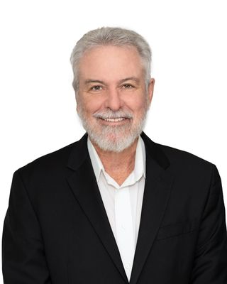 Portrait of Pat Calhoon, REALTOR®.
